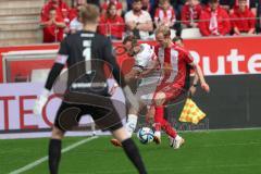 3. Liga - Saison 2023/24 - Rot-Weiss Essen - FC Ingolstadt 04 -  - David Kopacz (Nr.29 - FCI) - Lucas Brumme (#14 Essen) - Foto: Meyer Jürgen