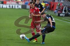 2. BL - Saison 2013/2014 - FC Ingolstadt 04 - SC Paderborn - Pascal Groß (20) kommt zu spät 22 Michael Heinloth klärt