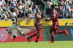 1. Bundesliga - Fußball - Borussia Mönchengladbach - FC Ingolstadt 04 - Fabian Johnson (#19 Borussia) Marcel Tisserand (32, FCI) Marvin Matip (34, FCI)