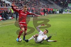 1. Bundesliga - Fußball - FC Ingolstadt 04 - FC Bayern - Kampf um den Ball Florent Hadergjonaj (33, FCI) und Thomas Müller (25 Bayern) am Boden grätscht