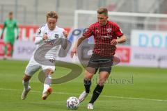 3. Fußball-Liga - Saison 2020/2021 - FC Ingolstadt 04 - SpVgg Unterhaching - Gordon Büch (#18,FCI) - Luca Marseiler (#30 Unterhaching) - Foto: Meyer Jürgen