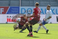 3. Fußball-Liga - Saison 2020/2021 - FC Ingolstadt 04 -  KFC Uerdingen - Michael Heinloth (#17,FCI)  - Filip Bilbija (#35,FCI)  - Foto: Meyer Jürgen