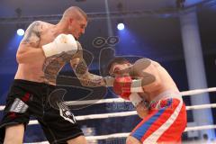 Stekos Fight Night - Postpalast - Kickboxen - Boxen - Nika Nakashidze (Geo) (rote Hose) gegen Bojan Aladzic (GER) schwarze Hose, Boxkampf, Sieger Aladzic