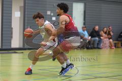 Basketball Bayernliga Herren - Saison 2026/27 - PSV Ingolstadt - TSV Milbertshofen - Petrovic Noel Dian weiss Ingolstadt - Göbel Fabian rot Milbertshofen - Foto: Meyer Jürgen