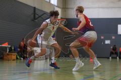 Basketball Bayernliga Herren - Saison 2026/27 - PSV Ingolstadt - TSV Milbertshofen - Schnug Josua rot Milbertshofen - Petrovic Noel Dian weiss Ingolstadt - Foto: Meyer Jürgen