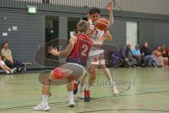 Basketball Bayernliga Herren - Saison 2026/27 - PSV Ingolstadt - TSV Milbertshofen - Petrovic Noel Dian weiss Ingolstadt - Schnug Josua rot Milbertshofen - Foto: Meyer Jürgen