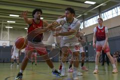 Basketball Bayernliga Herren - Saison 2026/27 - PSV Ingolstadt - TSV Milbertshofen - Ergin Sertan weiss Ingolstadt - Göbel Fabian rot Milbertshofen - Foto: Meyer Jürgen