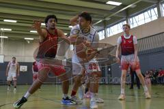 Basketball Bayernliga Herren - Saison 2026/27 - PSV Ingolstadt - TSV Milbertshofen - Ergin Sertan weiss Ingolstadt - Göbel Fabian rot Milbertshofen - Foto: Meyer Jürgen