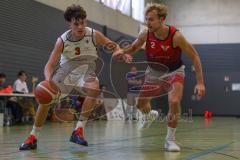 Basketball Bayernliga Herren - Saison 2026/27 - PSV Ingolstadt - TSV Milbertshofen - Schnug Josua rot Milbertshofen - Petrovic Noel Dian weiss Ingolstadt - Foto: Meyer Jürgen