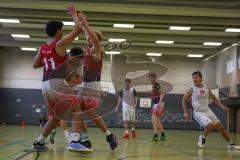Basketball Bayernliga Herren - Saison 2026/27 - PSV Ingolstadt - TSV Milbertshofen - Aicinci Ahmed weiss Ingolstadt - Schnug Josua rot Milbertshofen - Göbel Fabian rot Milbertshofen #11 - Foto: Meyer Jürgen
