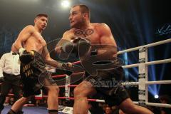 Fight-Night Profi-Boxen - München - Eisbach Studios  - Profi Debüt - Emre Cukur (München) - Dejan Krneta (Bosnien Herzegowina) - Cukur Sieger nach Punkten, links
