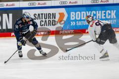 Penny DEL - Eishockey - Saison 2021/22 - ERC Ingolstadt - Red Bull München - Louis Brune (#50 ERCI) - Filip Varejcka (#91 München) -  Foto: Jürgen Meyer