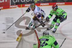 DEL - Eishockey - Saison 2020/21 - ERC Ingolstadt - Eisbären Berlin - Parker Tuomie (#10 Berlin) - Tim Wohlgemuth (#33 ERCI) - Foto: Jürgen Meyer