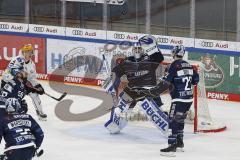 Im Bild: Kevin Reich Torwart (#35 ERCI) fängt den Puck - Mathew Bodie (#22 ERCI) Louis Brune (#50 ERCI) David Warsofsky (#55 ERCI) Ross Mauermann (Bremerhaven) sehen zu

