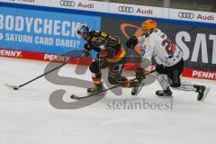 Penny DEL - Eishockey - Saison 2021/22 - ERC Ingolstadt - Fishtown Pinguin Bremerhaven - Justin Feser (#71 ERCI) - D.Uher #26 Bremerhaven -  Foto: Jürgen Meyer