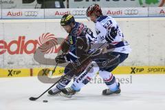 DEL - ERC Ingolstadt - Iserlohn Roosters - Jared Ross (42) und rechts Colten Teubert