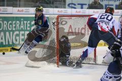 DEL - Eishockey - PlayOff - ERC Ingolstadt - Iserlohn Roosters - 1. Spiel - Jean-Francois Boucher (ERC 84) wird ins Tor geschubst von Lavallée Kevin (Iserlohn 20)