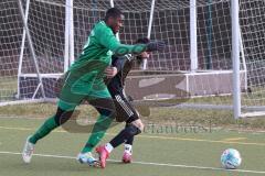 Freundschaftsspiel - Türk SV Ingolstadt - SV Manching - Saison 2023/23 - Mamadou Diallo grün Manching - Adem Ismajli schwarz Türk SV - Foto: Meyer Jürgen