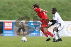 Kreisliga - Saison 2025/26- SV Zuchering - FC Mindelstetten - Nico Ziegler rot Zuchering -  - Qusseynou Tamba weiß Mindelstetten  - Foto: Meyer Jürgen