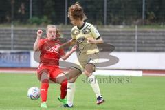 2. Fußball-Liga - Frauen - Saison 2022/2023 - FC Ingolstadt 04 - TSG Hoffenheim - Wolski Lea (Nr.5 - FC Ingolstadt 04 ) - Braun Ann-Sophie gold Hoffenheim - Foto: Meyer Jürgen