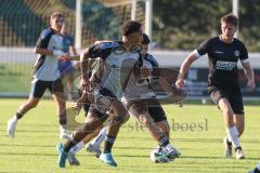 Bezirksliga - Saison 2025/26 - TSV Ober./Unterhaunstadt - VFR Garching - Angelo Boharu (Nr.19 - TSV Ober-/Unterh.stadt) - Mike Niebauer schwarz Garching - Foto: Meyer Jürgen