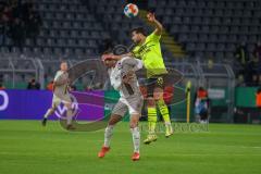 DFB Pokal - Saison 2021/2022 - Borussia Dortmund - FC Ingolstadt 04 - Fatih Kaya (#9 FCI) - Emre Can (#23 Dortmund) - Foto: Stefan Bösl