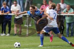 Kreisliga - Saison 2023/2024 - SV Menning - FC Mindelstetten - Simon Wolfsfellner blau Menning Jonas Schoberer weiss Mindelstetten - - Foto: Meyer Jürgen
