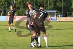Bezirksliga - Saison 2025/26 - TSV Ober./Unterhaunstadt - VFR Garching - Oliver Günther - TSV Ober-/Unterh.stadt) - Luca Monetti schwarz Garching - Foto: Meyer Jürgen