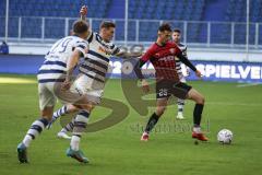 3. Liga; MSV Duisburg - FC Ingolstadt 04; Zweikampf Kampf um den Ball Arian Llugiqi (25, FCI) Sebastian Mai (28 MSV) Joshua Bitter (29 MSV)