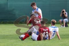 Kreisliga - Saison 2023/2024 - Türk SV Ingolstadt - TSV Mümchsmünster - Melih Soysal rot Türk SV #52 - Maximilian Anthofer weiss M-münster rechts - Baha Asici #42 rot Türk Sv - Foto: Meyer Jürgen