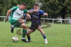 Kreisklasse - Saison 2025/26- SV Haunwöhr - FC Geisenfeld  - Stefan Schmaizl grün Geisenfeld - Lukas Markus blau Haunwöhr - Foto: Meyer Jürgen