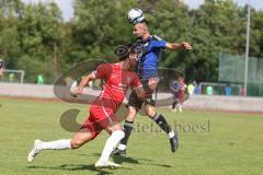 Testspiel - Bezirksliga - Saison 2025/26 - FC Fatih Ingolstadt - TSV Burgheim - Atilla Demir rot Fatih - Florin Horoba blau Burgheim - Foto: Meyer Jürgen