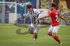Bayernliga Nord - Saison 2026/27 - FC Ingolstadt 04 II - ASV Cham - Timo Hengmith (Nr.10 - FCI II) - Simon Haimerl rot Cham - Foto: Meyer Jürgen