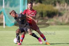 Kreisklasse - Saison 2023/2024 -SV Zuchering - SV Oberstimm - Julian Weidinger schwarz Oberstimm - Lukas Högele rot Zuchering - Foto: Meyer Jürgen