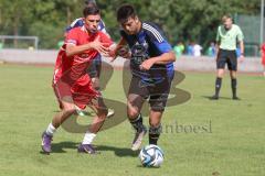 Testspiel - Bezirksliga - Saison 2025/26 - FC Fatih Ingolstadt - TSV Burgheim - Aaron Toski rot Fatih - Nick Vogel blau Burgheim  - Foto: Meyer Jürgen