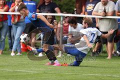 Kreisliga - Saison 2023/2024 - SV Menning - FC Mindelstetten - Simon Wolfsfellner blau Menning Jonas Schoberer weiss Mindelstetten - - Foto: Meyer Jürgen