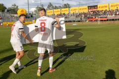 Toto-Pokal Finale; Würzburger Kickers - FC Ingolstadt 04; nach dem Spiel Sieg Jubel Freude Pokalsieg 1:2, Spieler bedanken sich bei den Fans. Pascal Testroet (37, FCI) Benjamin Kanuric (8, FCI) bringen das Siegerschild zu den Fans