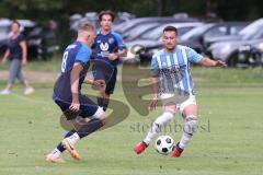 Kreisliga - Saison 2023/2024 - SV Menning  - FC Sandersdorf - Marcel von Schuttenbach blau Menning - Christian Geß weiss SandersdorfFoto: Meyer Jürgen