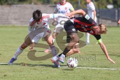 *** A-Junioren Bundesliga  - Saison 2025/26 - A-Junioren - FC Ingolstadt 04 - 1. FC Nürnberg - Haxhiu Lion weiss Nürnberg - Michelbach Kilian rot FCI - Foto: Meyer Jürgen