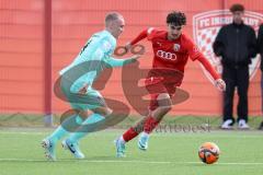 A-Junioren Bundesliga  - Saison 2023/24 - A-Junioren - FC Ingolstadt 04 - TSV 1860 München - Berkey Öztürk (Nr.8 - FC Ingolstadt 04 A-Jugend) - Faßmann Lasse blau München - Foto: Meyer Jürgen