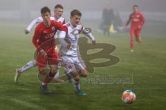 B - Junioren - Bayernliga - U17 - FC Ingolstadt 04 - 1. FC Nürnberg II -  Stahl Fabian rot FCI - Schreiber Julian weiss Nürnberg links - Hagmeier Ben weiss hinten Nürnberg - Foto: Meyer Jürgen