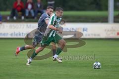 Landesliga - Saison 2025/26 - SV Manching - TSV Jetzendorf - Sebastian Graßl (Nr.10 - SV Manching) - Julius Donnert grau Jetzendorf - Foto: Meyer Jürgen