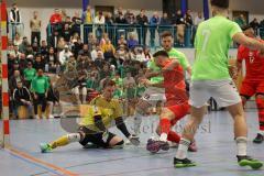 Lotto - Hallen - Bayerncup - Oberbayern -  Saison 2022/2023  - FC Fatih Ing - FC Penzberg - Finale - 1:0 - Mehmet Sin rot Fatih - Martin Meier Torwart Penzberg -  - Foto: Meyer Jürgen