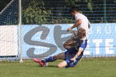 Kreisliga - Saison 2023/2024 - TSV Ober/Unterh.stadt- TSV Mümchsmünster - Nick Wagner blau Oberhstadt - Andre Bräuning grau M.Münster - Foto: Meyer Jürgen