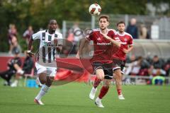 Saison 2026/27 - Freundschaftsspiel - 1. FC Nürnberg - FC Ingolstadt 04 - Joseph Ganda (Nr.16 - FCI) - Styopa Mkrtchyan (Nr.5 - FCN) - Foto: Meyer Jürgen