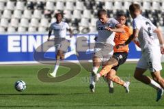 3.Liga - Saison 2023/2024 - SC Freiburg II - FC Ingolstadt 04 - Pascal Testroet (Nr.37 - FCI) - Julian Stark (Nr.11 - Freiburg II) - Foto: Meyer Jürgen