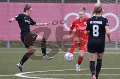 2. Fußball-Liga - Frauen - Saison 2022/2023 - FC Ingolstadt 04 - SC Freiburg II - Nina Penzkofer (Nr.29 - FCI Frauen) - Axtmann Alina schwartz links Freiburg - Foto: Meyer Jürgen