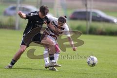 Kreisliga - Saison 2025/26- SV Karlskron - SV Kasing - Emre Erbas weiss Kasing - Paul Dorschner schwarz Karlskron   - Foto: Meyer Jürgen