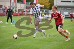 Saison 2026/27 - Freundschaftsspiel - 1. FC Nürnberg - FC Ingolstadt 04 - Ognjen Drakulic (Nr.30 - FCI) - Tim Janisch (Nr.32 - FCN) - Foto: Meyer Jürgen