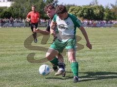 Relegation - Saison 2025/26 - SV Karlskron - FC Geisenfeld - Stefan Schmailzl grün Geisenfeld - Paul Dorschner schwarz Karlskron  - Foto: Meyer Jürgen